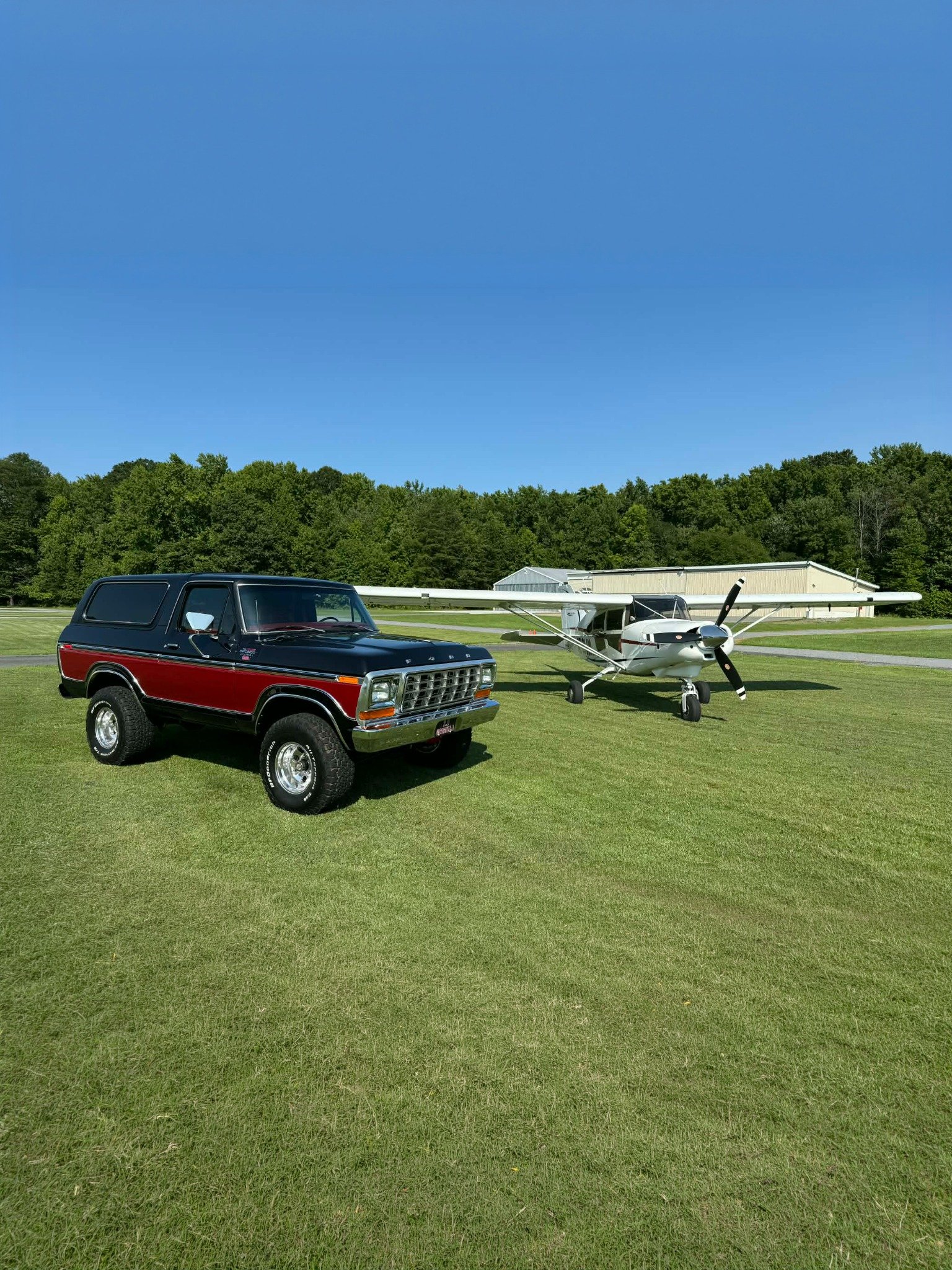 Matko Motors Bronco photographed beside an airplane